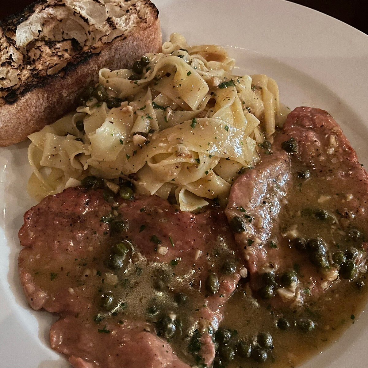 Oggi Ristorante Italiano signature dishes Veal PiccataLinguine con Vongole (Linguine with Clams)Gnocchi alla Sorrentina